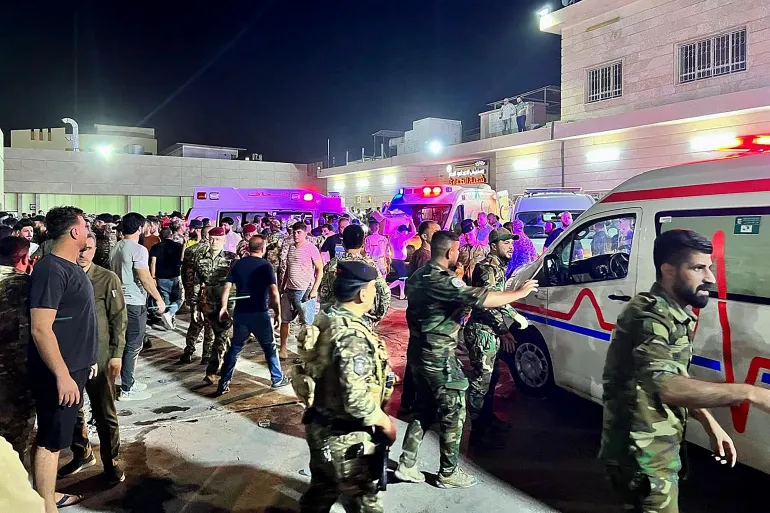 At least 100 or more killed as fire engulfs wedding party in Iraq